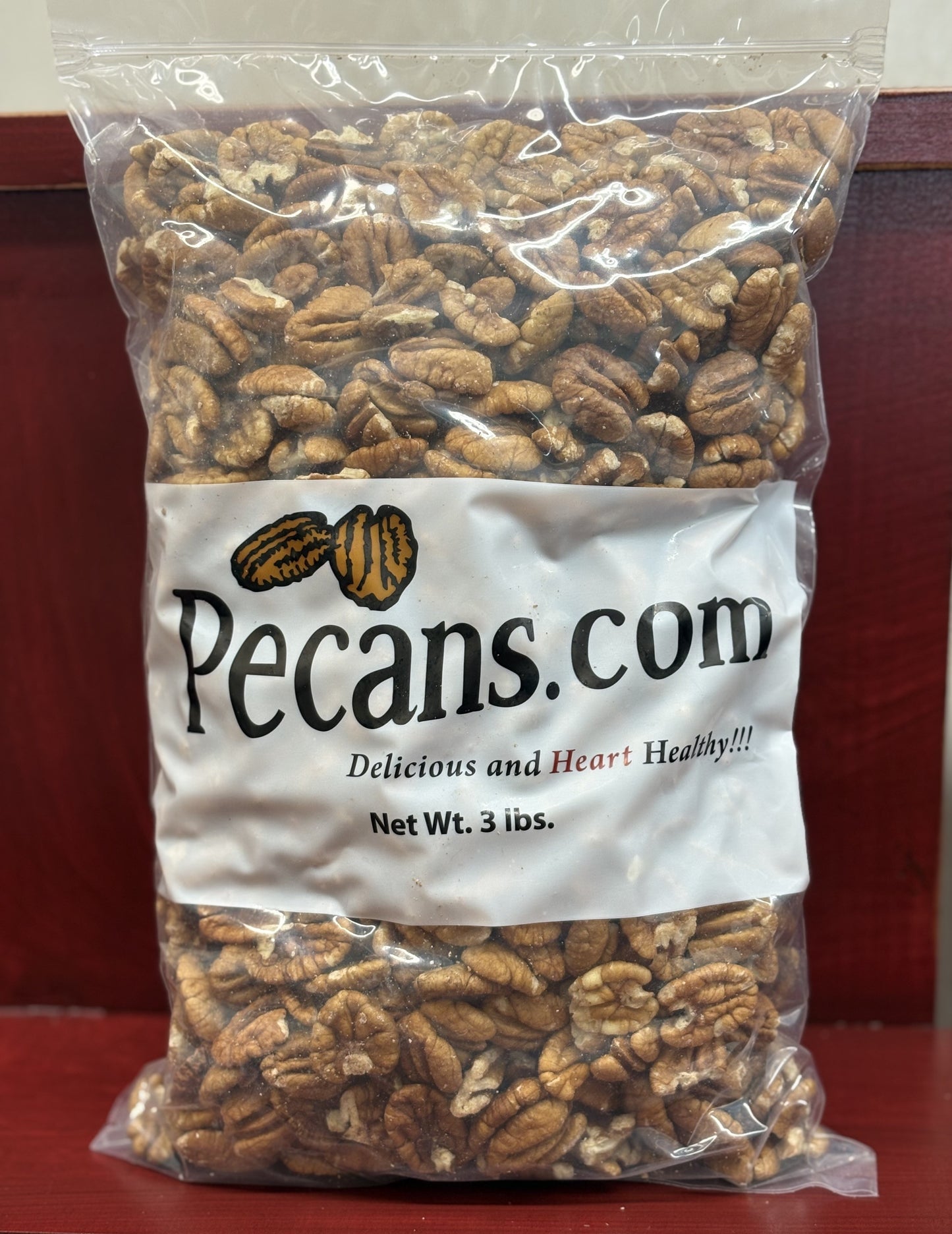3 pound bag Pecans.com fresh shelled pecan halves. Great for snacking or baking.