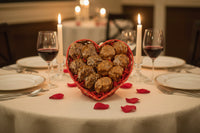 Pecan Pralines in a wicker heart basket, 6 chewy and 6 creamy pecan pralines.