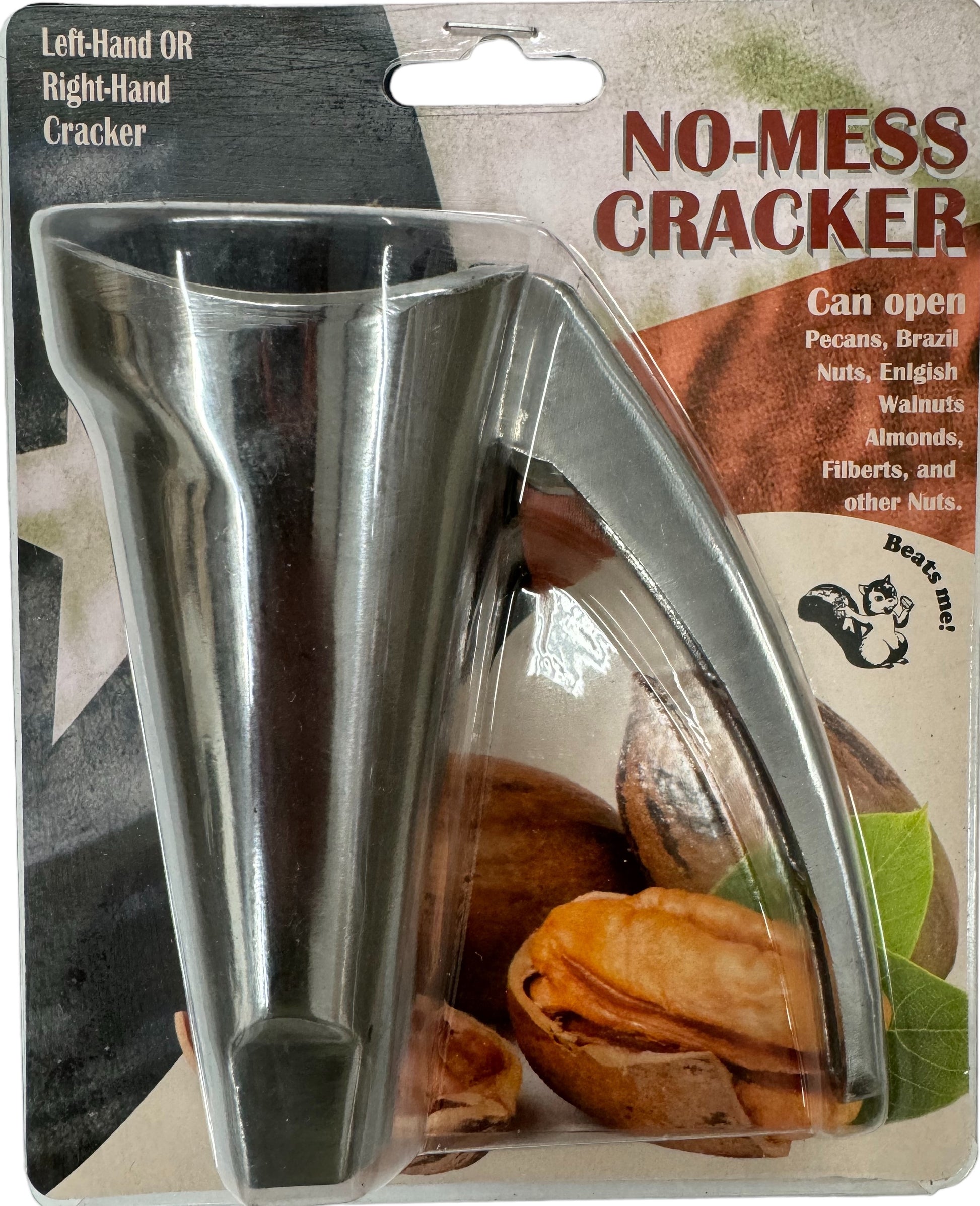 No Mess Nutcracker. Handheld nutcracker that keeps the shell contained for easy disposal.