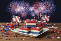 Layered fudge with red, white, and blue colors on a plate.