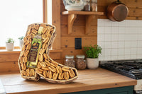Pecan Oil and raw pecans in a wicker boot basket