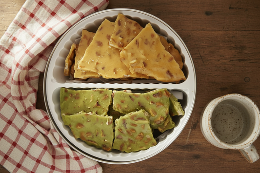 Pecan and Jalapeno Pecan Brittle in a divided Tin. Some for you and some for  your spicy friend to share!